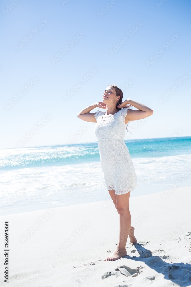 Pretty brunette relaxing beside the water Pretty brunette relaxing beside the water