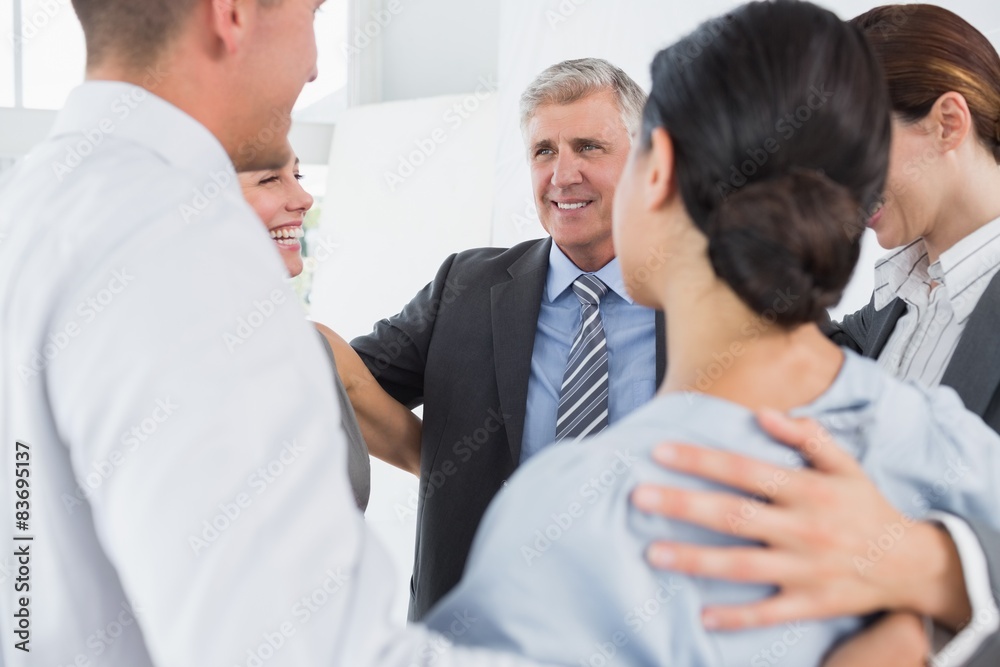 Business team standing in circle