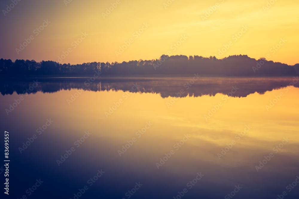 Vintage photo of sunset lake