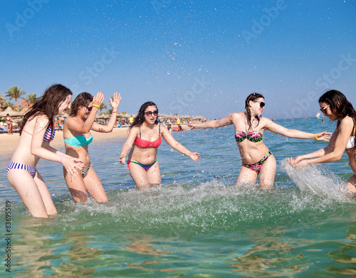 Young people having fun on the beach