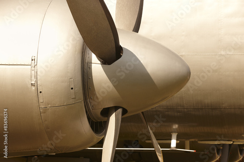 Billede på lærred Aircraft propeller engines airframe and blades in warm tone