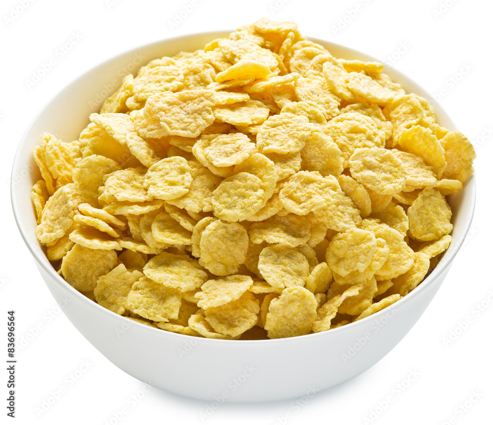 Cornflakes in the bowl on white background. Cornflakes in the bowl on white background.