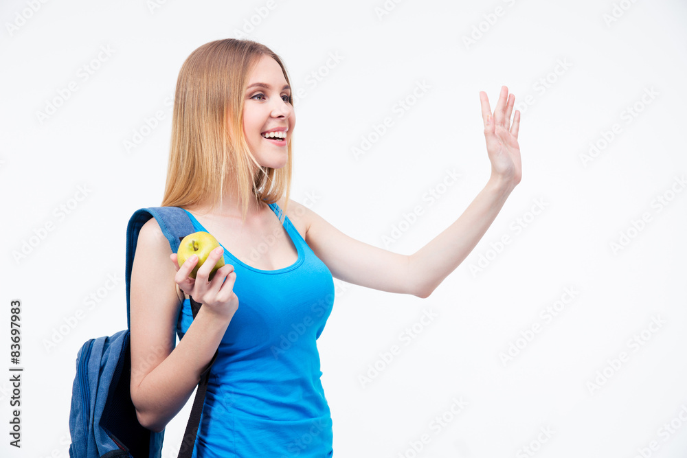 Fototapeta premium Young woman making salutation sign