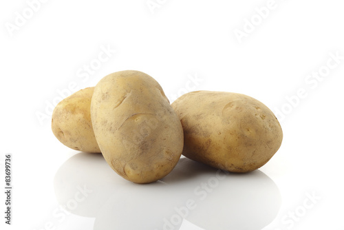 Three Potatoes on White Background