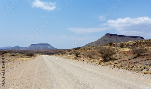 endless road in Namibia moonscape landscape photo