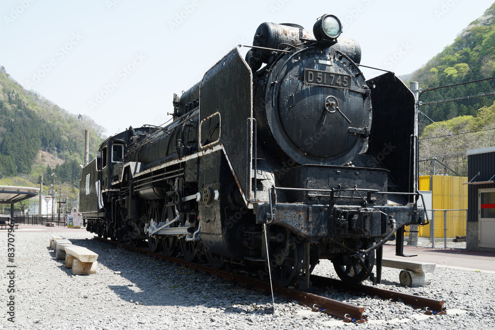 Ancient steam locomotive and blue sky in Gumma Japan Ancient steam locomotive and blue sky in Gumma Japan