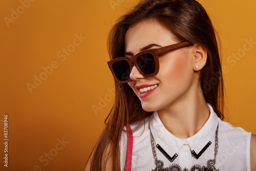 Fashion portrait of a beautiful brunette woman