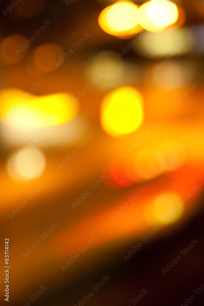 Fototapeta premium golden bright lights on dark night background