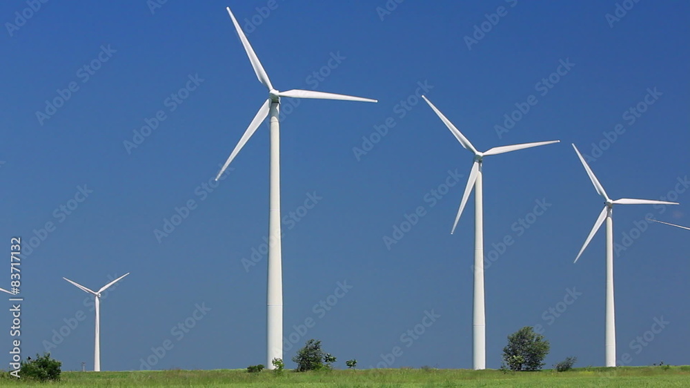 Huge Windmill Turbines Generating Electricity on Windy Day
Huge Windmill Turbines Generating Electricity on Windy Day