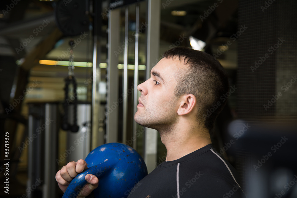 Kettlebell swing workout training man at gym Kettlebell swing workout training man at gym