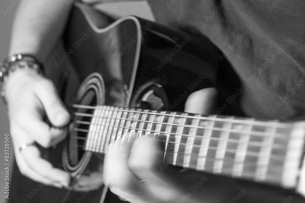 Fototapeta premium Fast hands on acoustic guitar