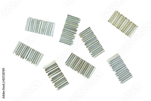 Corrugated joint fasteners on white background.