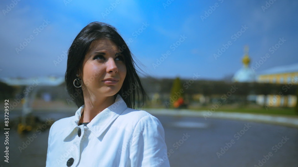 Young beautiful woman about fountain in Petrodvorets Young beautiful woman about fountain in Petrodvorets