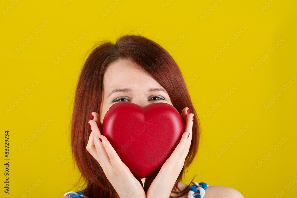 Love concept with joyful young woman smiling Love concept with joyful young woman smiling