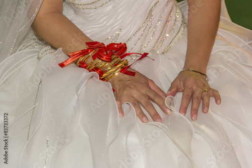 traditional wedding bride gold jewelery close up