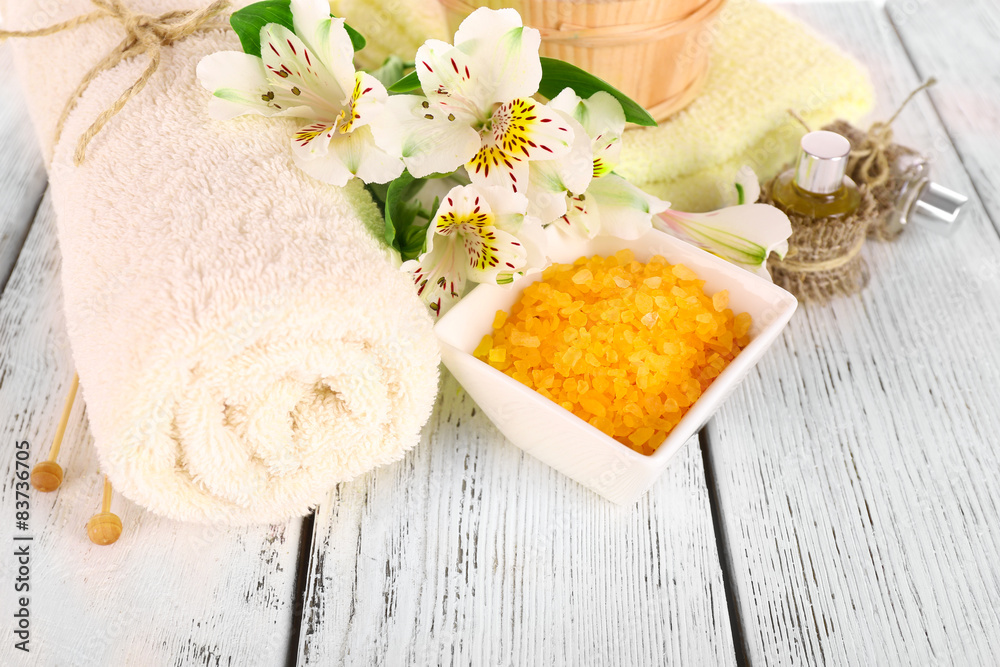 Spa still life with flower on wooden table, closeup Spa still life with flower on wooden table, closeup