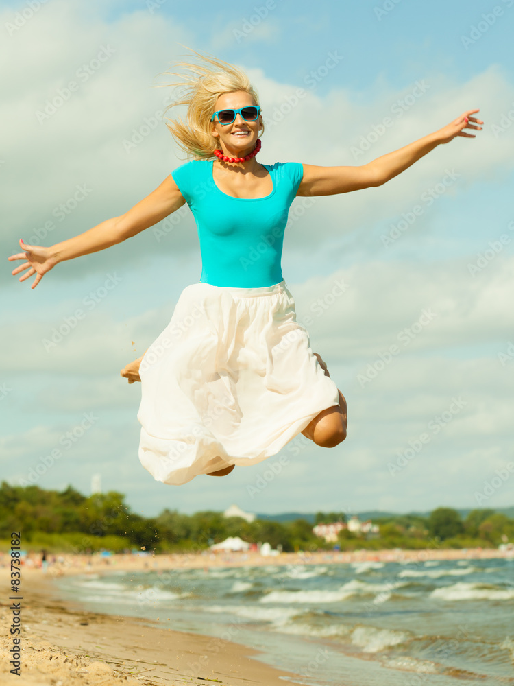 Beautiful blonde girl on beach, summertime Beautiful blonde girl on beach, summertime