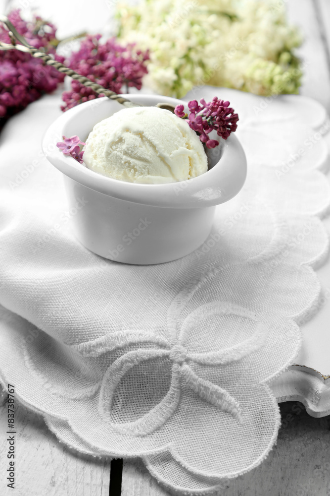 Beautiful composition with tasty ice cream and lilac flowers Beautiful composition with tasty ice cream and lilac flowers