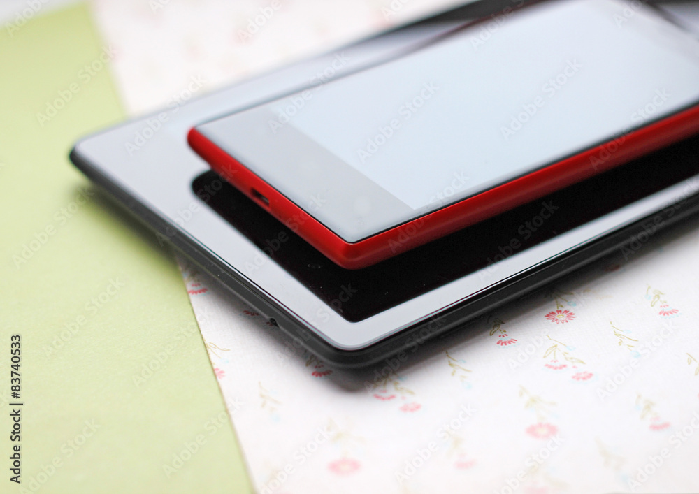 red phone and black tablet red phone and black tablet