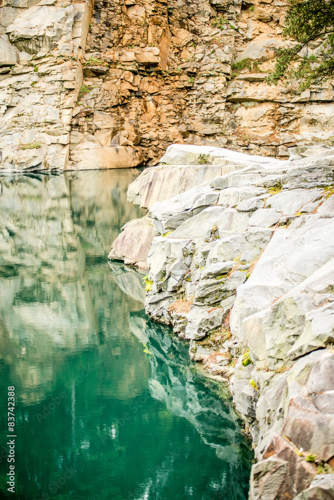 stone and  reflections at a quarry