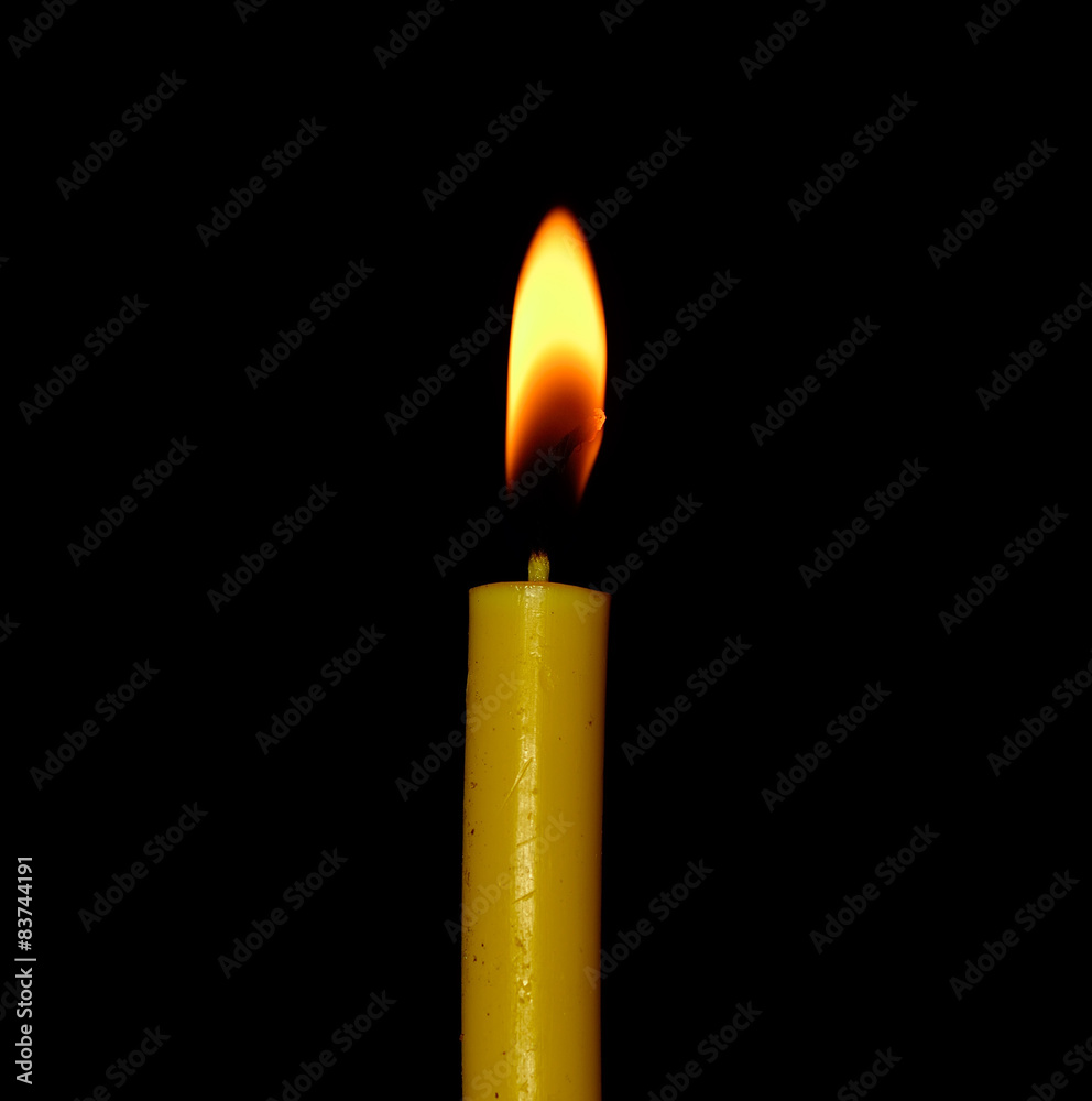 Candle flame closeup isolated on black background Candle flame closeup isolated on black background