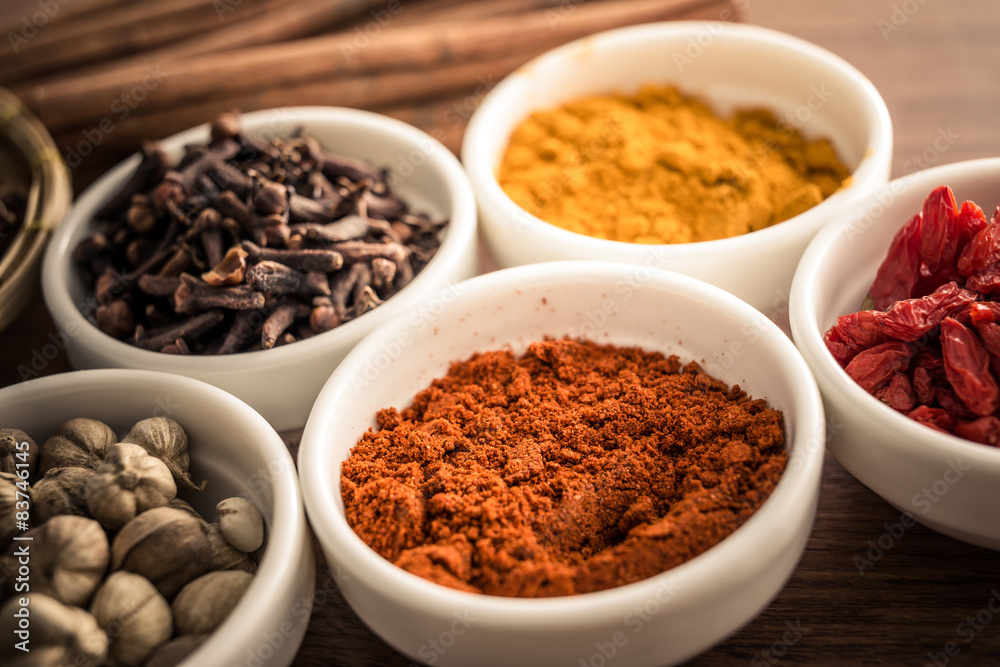 Wooden table of colorful spices