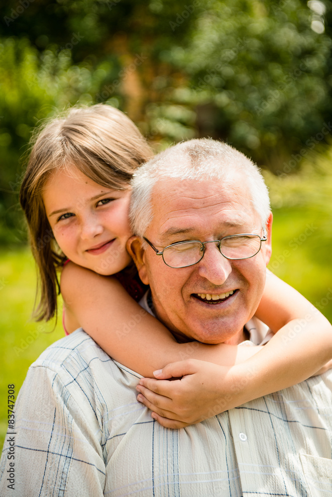 Happy grandfather with grandchild