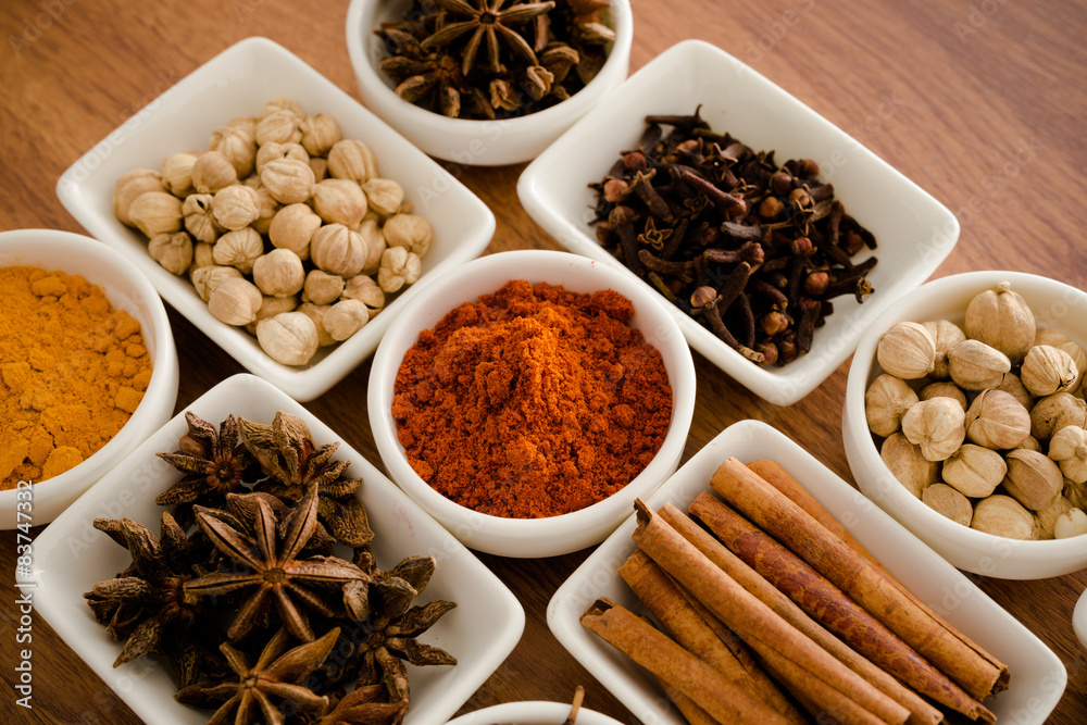 Wooden table of colorful spices Wooden table of colorful spices