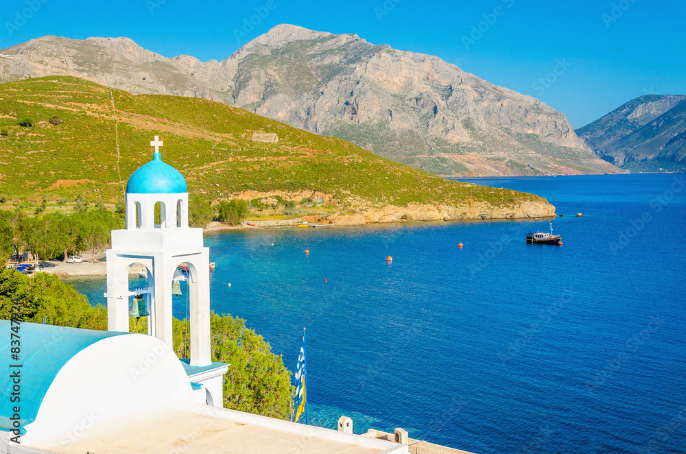 Blue dome of Greek church and sea, Greece