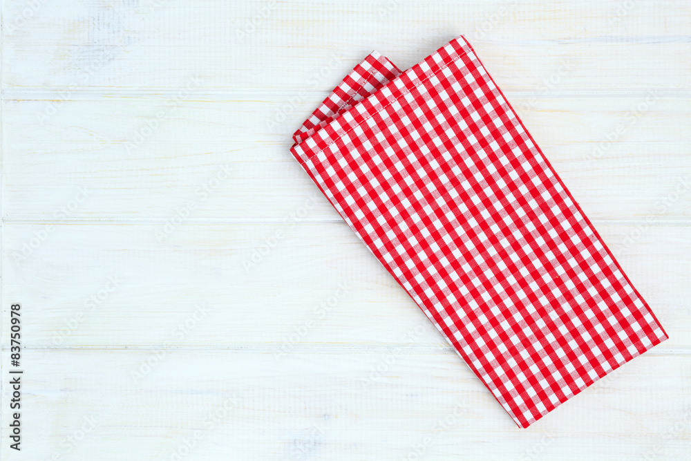 Red towel over wooden kitchen table. View from above with copy s Red towel over wooden kitchen table. View from above with copy s