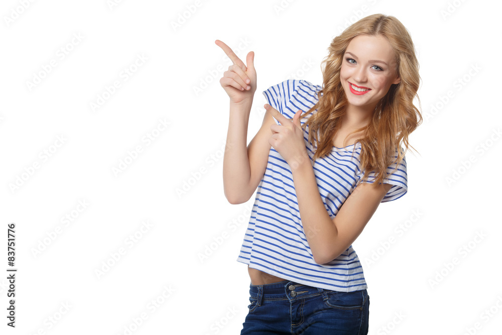 Young woman pointing at blank copy space, isolated over white Young woman pointing at blank copy space, isolated over white