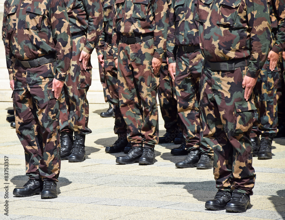 Soldiers in camouflage uniform Soldiers in camouflage uniform