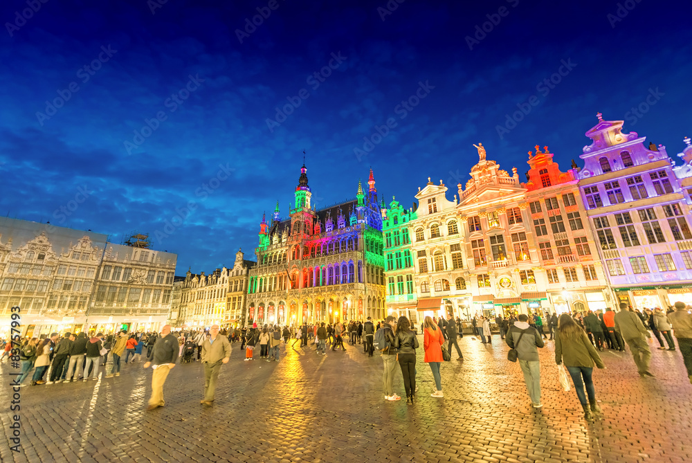 BRUSSELS - MAY 1, 2015: Tourists at night in Grote Marks Square.