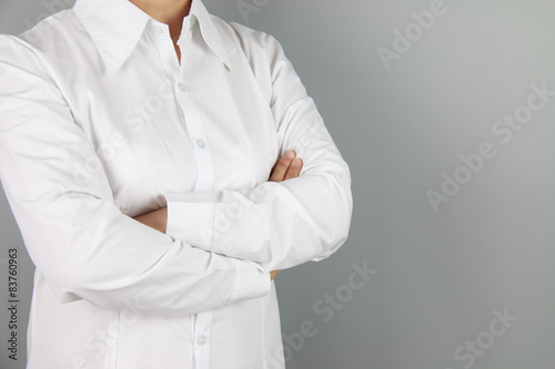 Business woman on a gray background