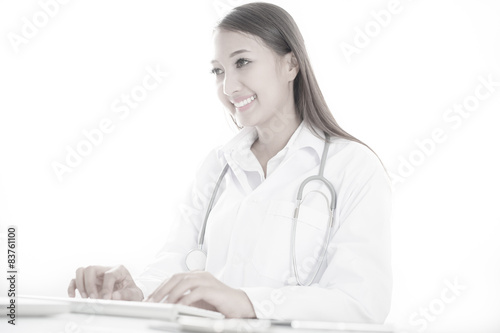 Young and professional doctor working in office