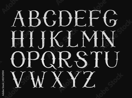 Alphabet hand-drawn on chalkboard