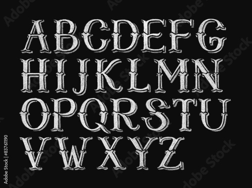 Alphabet hand-drawn on chalkboard