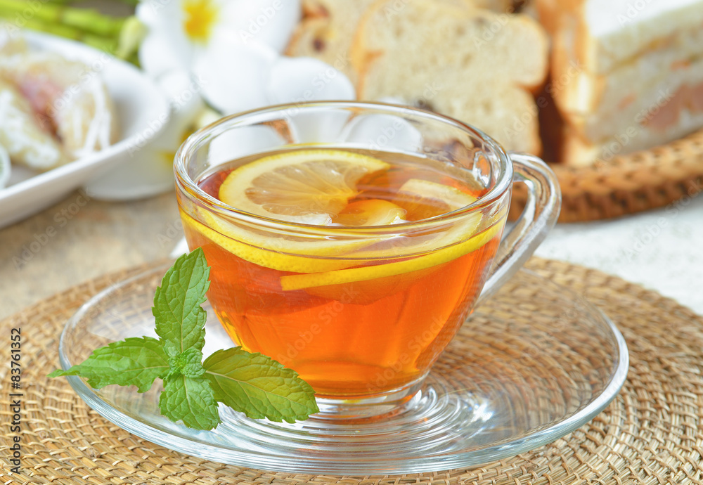 cups of tea with mint on wooden table cups of tea with mint on wooden table