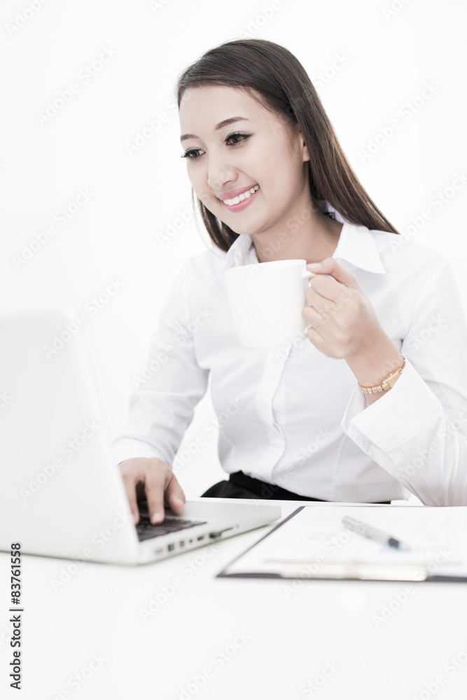 Young business woman working at office