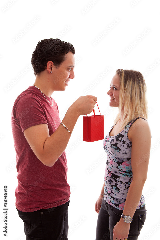 Man is giving present to his girlfriend Man is giving present to his girlfriend