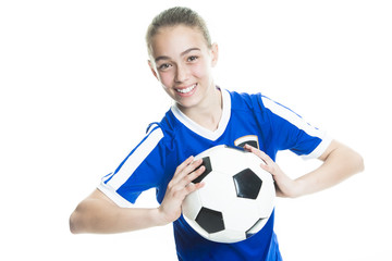girl in sport wear with football isolated on white background