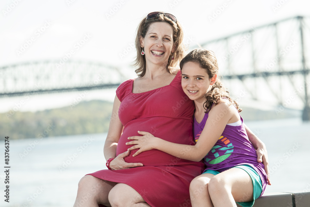 pregnant mother and her daughter pregnant mother and her daughter
