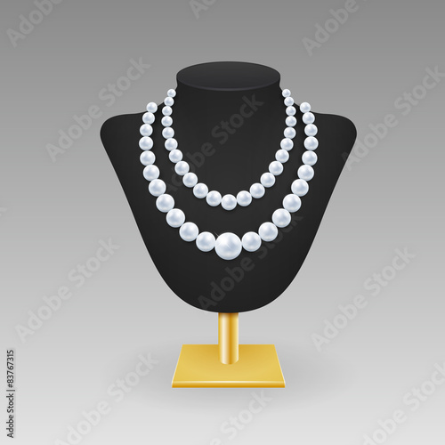 Pearl necklace on a rack