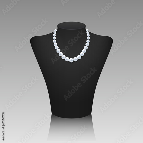 Pearl necklace on a rack