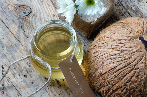 Coconut oil, essential oil, organic cosmetic photo