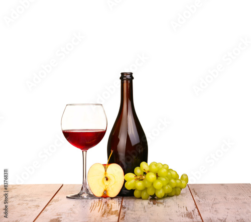 glass of wine, a glass of wine and grapes on board isolated 
