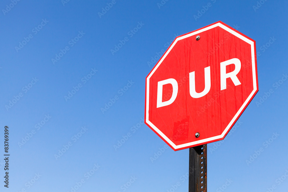 Turkish stop road sign over clear blue sky Turkish stop road sign over clear blue sky