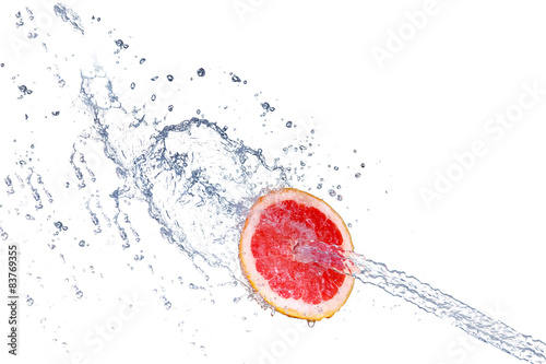 grapefruit with water splash, isolated on white background