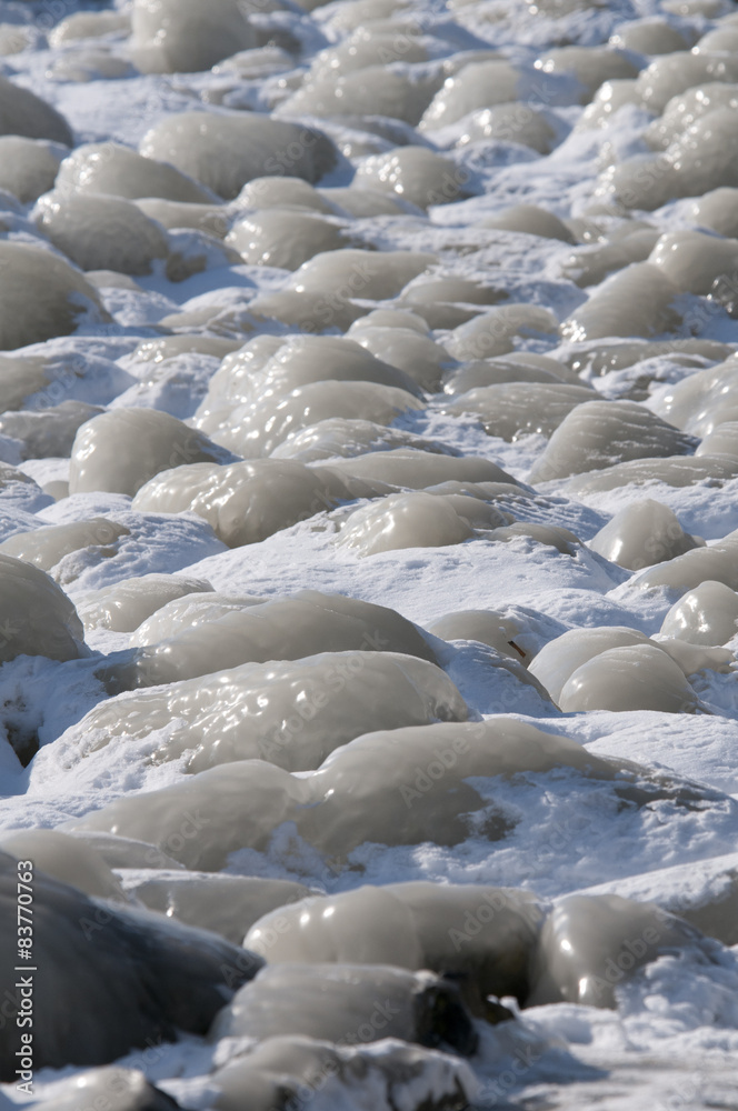 Fototapeta premium ice on boulders, The Netherlands