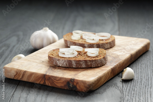 rye bread grated with garlic with leek, crostini